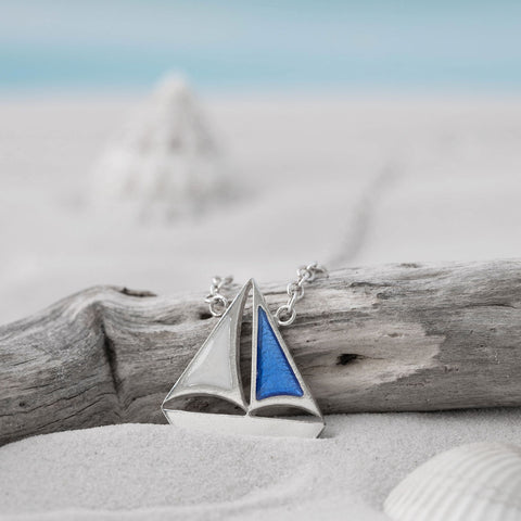 Silver Sail Boat Necklace with Blue and White Resin sails on driftwood, by Kate Wimbush Jewellery