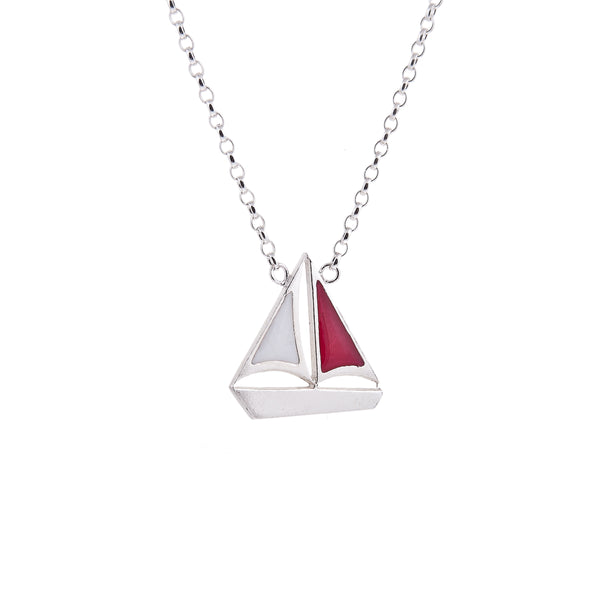 Silver Sail boat Yacht Pendant with red sails on white background by Kate Wimbush Jewellery