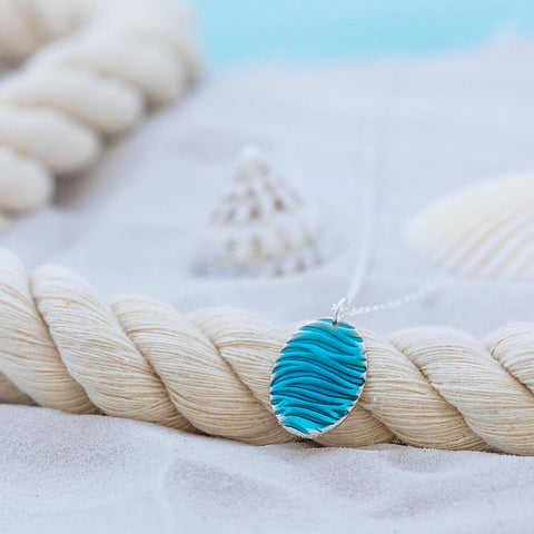 Silver Oval Blue Resin Ripple Texture Pendant on chain by Kate Wimbush Jewellery