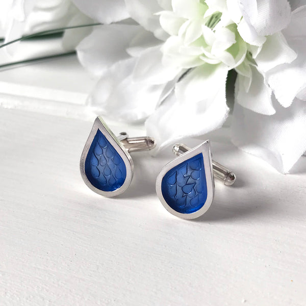 Silver hand stamped raindrop t-bar cufflinks with blue resin by Kate Wimbush Jewellery