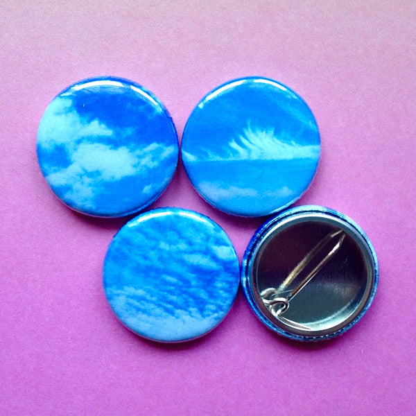Round button badge set blue sky white clouds kate wimbush jewellery