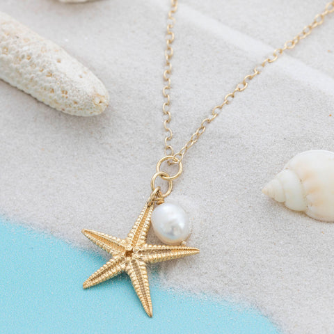 Gold plated Starfish pendant with freshwater pearl charm on chain by Kate Wimbush Jewellery