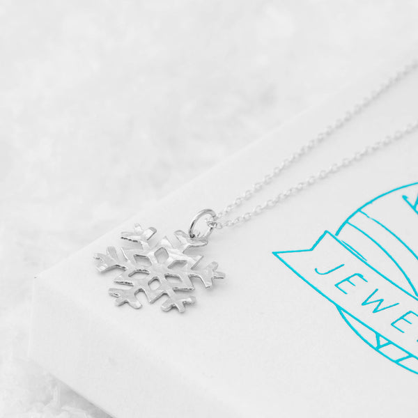 Large Silver Snowflake Pendant Necklace on Kate Wimbush jewellery branded box