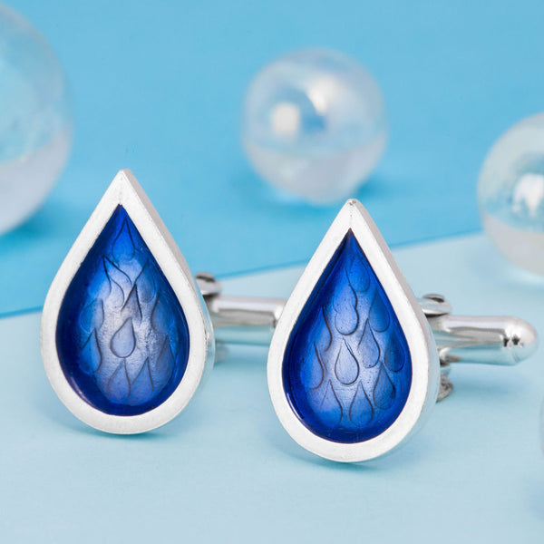 Silver stamped raindrop t-bar cufflinks with blue resin inlay, by Kate Wimbush Jewellery