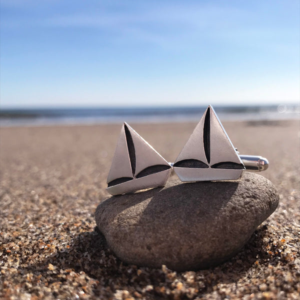 Silver Sail Boat t-bar cufflinks on Scarborough Beach by Kate Wimbush Jewellery