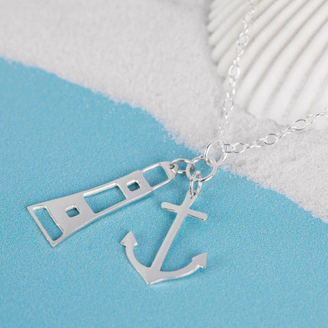 Silver Lighthouse and Anchor charm pendant on chain, by Kate Wimbush Jewellery