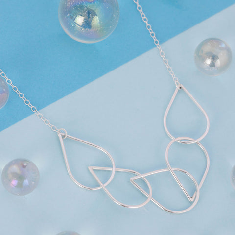 Silver necklace with 5 raindrop shaped links  by Kate Wimbush Jewellery