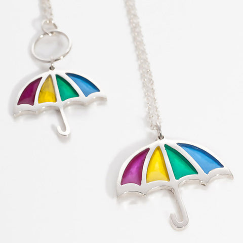 Silver Rainbow Resin Umbrella Pendants on white background, Kate Wimbush Jewellery