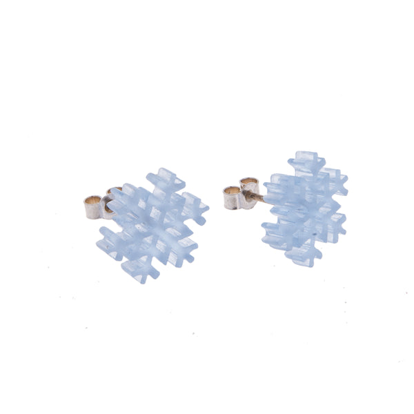 Small Frosted Blue Perspex Snowflake Stud Earrings with silver posts and backs on white background by Kate Wimbush Jewellery
