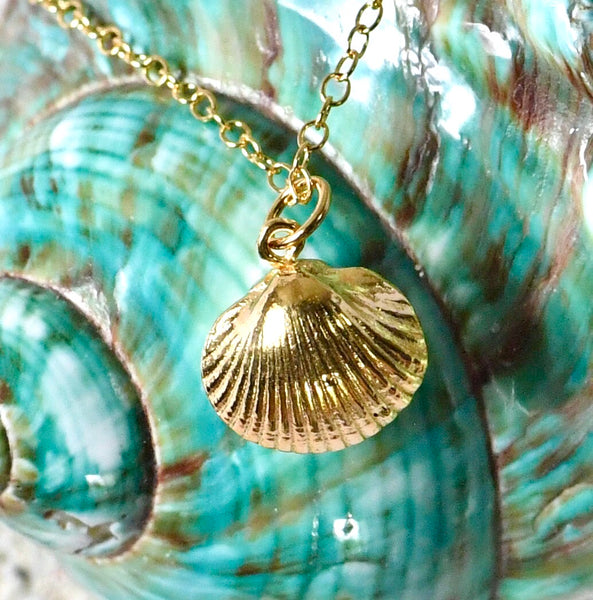 Solid gold cockle shell pendant on green shell by Kate Wimbush Jewellery